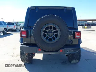 2023 Jeep Wrangler Sport S z VIN 1C4HJXDG5PW530892, wystawiony jako IAAI lot #41389577 z przebiegiem 17 014 mil mil oraz . Historia ofert i sprzedaży dostępna na DreamBid. Obrazek 17.