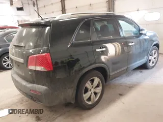 2013 Kia Sorento EX with VIN 5XYKUDA63DG410184, listed as a IAAI auction lot 41416399 with 214,623 mi miles. Bid and sale history available at carsss.com. Image 4.