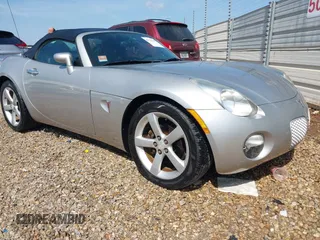 2006 Pontiac Solstice z VIN 1G2MB33B36Y000714, wystawiony jako IAAI lot #42125345 z przebiegiem 101 845 mil mil oraz . Historia ofert i sprzedaży dostępna na DreamBid. Obrazek 1.