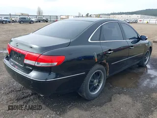 2007 Hyundai Azera SE with VIN KMHFC46F67A186034, listed as a IAAI auction lot 39181735 with 128,930 mi miles. Bid and sale history available at carsss.com. Image 4.