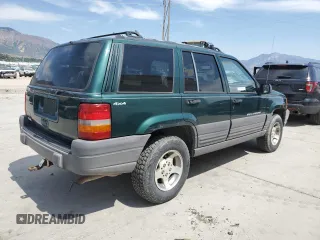 1996 Jeep Grand Cherokee Laredo z VIN 1J4GZ58S8TC222435, wystawiony jako Copart lot #62347665 z przebiegiem 202 125 mil mil oraz Czysty tytuł • Clean title. Historia ofert i sprzedaży dostępna na DreamBid. Obrazek 3.