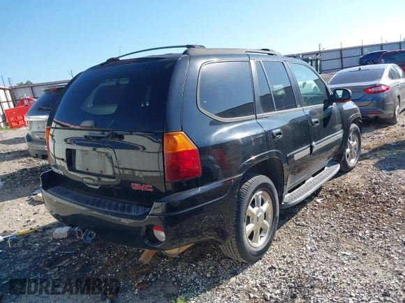2002 GMC Envoy SLT z VIN 1GKDT13S322146884, wystawiony jako IAAI lot #42244937 z przebiegiem 203 633 mil mil oraz . Historia ofert i sprzedaży dostępna na DreamBid. Obrazek 4.