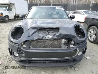 2017 MINI Clubman Cooper S with VIN WMWLU5C57H2E82584, listed as a Copart auction lot 48861365 with 90,418 mi miles and Salvage Title. Bid and sale history available at DreamBid. Image 5.