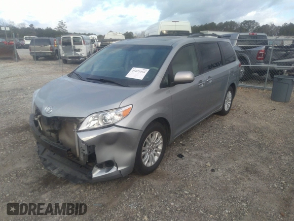 2014 Toyota Sienna XLE with VIN 5TDYK3DC0ES421501, listed as a IAAI auction lot 41672414 with 111,911 mi miles. Bid and sale history available at carsss.com. Image 17.
