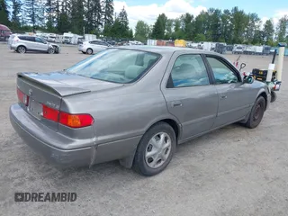 2001 Toyota Camry CE z VIN 4T1BG22K31U069222, wystawiony jako IAAI lot #42346667 z przebiegiem 197 423 mil mil oraz . Historia ofert i sprzedaży dostępna na DreamBid. Obrazek 4.