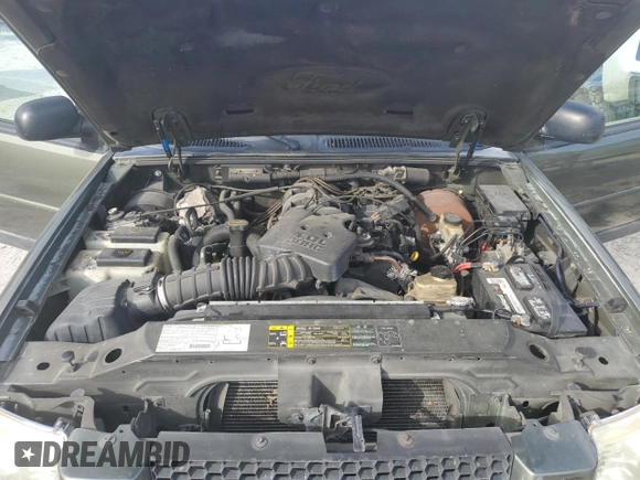 2003 Ford Explorer Sport XLS z VIN 1FMYU60EX3UA56154, wystawiony jako Copart lot #82259834 z przebiegiem 188 417 mil mil oraz Szkody całkowita. Historia ofert i sprzedaży dostępna na DreamBid. Obrazek 12.