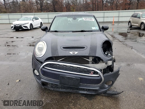 2014 MINI Hardtop S with VIN WMWXM7C54ET985344, listed as a Copart auction lot 52012465 with 87,017 mi miles and Salvage title. Bid and sale history available at DreamBid. Image 5.