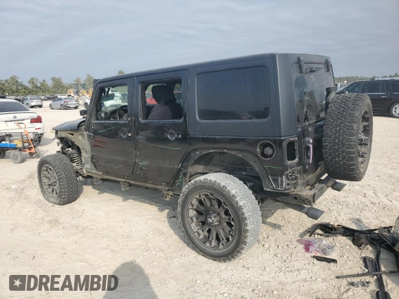 2018 Jeep Wrangler JK Unlimited Sport S with VIN 1C4BJWDGXJL908746, listed as a Copart auction lot 75881844 with 69,805 mi miles and Salvage Title. Bid and sale history available at carsss.com. Image 2.