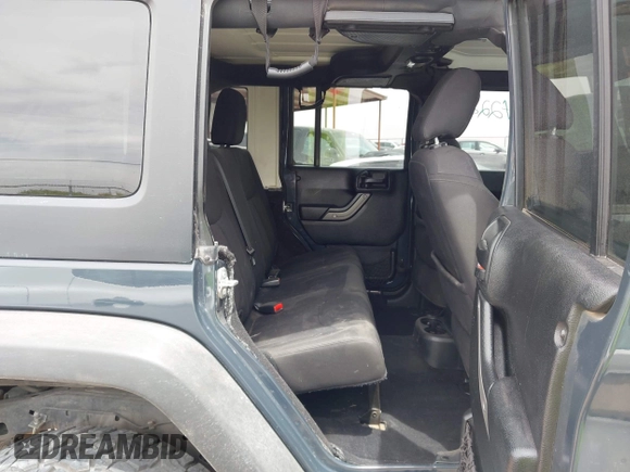 2017 Jeep Wrangler Unlimited Sport with VIN 1C4BJWDG2HL634291, listed as a IAAI auction lot 42242223 with 145,880 mi miles and . Bid and sale history available at DreamBid. Image 8.