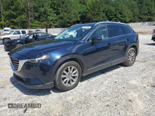2018 Mazda CX-9 Touring with VIN JM3TCACY9J0201318, listed as a Copart auction lot 61331895 with 87,659 mi miles and Salvage title. Bid and sale history available at DreamBid. Image 1.