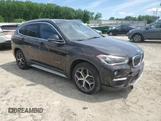2017 BMW X1 xDrive28i z VIN WBXHT3C39H5F72979, wystawiony jako Copart lot #56003625 z przebiegiem 101 184 mil mil oraz Szkoda całkowita • Salvage title. Historia ofert i sprzedaży dostępna na DreamBid. Obrazek 4.