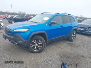2018 Jeep Cherokee Trailhawk with VIN 1C4PJMBX2JD570976, listed as a IAAI auction lot 41610469 with 151,255 mi miles. Bid and sale history available at carsss.com. Image 2.