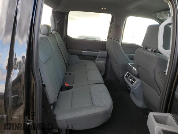 2024 Ford F-150 Lightning Flash z VIN 1FT6W3L73RWG21830, wystawiony jako Copart lot #43161725 z przebiegiem 23 mil mil oraz Czysty tytuł • Clean title. Historia ofert i sprzedaży dostępna na DreamBid. Obrazek 10.