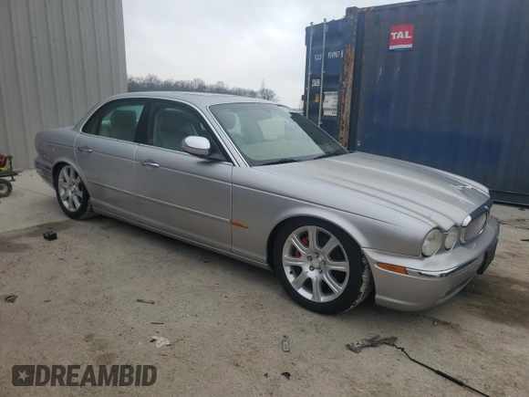2004 Jaguar XJ with VIN SAJEA74C64SG08121, listed as a Copart auction lot 81736984 with 100,144 mi miles and Non Repairable. Bid and sale history available at DreamBid. Image 4.