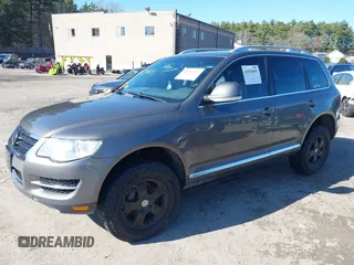 2010 Volkswagen Touareg VR6 with VIN WVGBF7A96AD004069, listed as a IAAI auction lot 41972994 with Not Provided miles and . Bid and sale history available at DreamBid. Image 2.