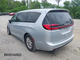 2024 Chrysler Pacifica Touring L with VIN 2C4RC1BG8RR139066, listed as a IAAI auction lot 42150531 with 18,777 mi miles and . Bid and sale history available at DreamBid. Image 3.