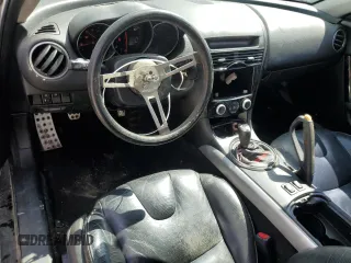 2005 Mazda RX-8 z VIN JM1FE173450141372, wystawiony jako Copart lot #55588025 z przebiegiem 178 213 mil mil oraz Szkody całkowita. Historia ofert i sprzedaży dostępna na DreamBid. Obrazek 8.