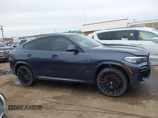 2022 BMW X6 xDrive40i z VIN 5UXCY6C08N9N30013, wystawiony jako IAAI lot #41772245 z przebiegiem 23 198 mil mil oraz . Historia ofert i sprzedaży dostępna na DreamBid. Obrazek 14.