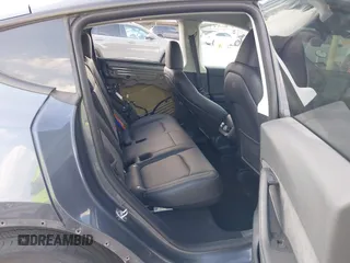 2023 Tesla Model Y Long Range with VIN 7SAYGDEEXPA078629, listed as a IAAI auction lot 42046354 with 27,245 mi miles and . Bid and sale history available at DreamBid. Image 8.