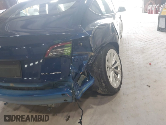 2022 Tesla Model 3 Long Range with VIN 5YJ3E1EB8NF255163, listed as a IAAI auction lot 42105451 with 40,166 mi miles and . Bid and sale history available at DreamBid. Image 19.