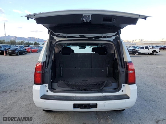 2019 Chevrolet Tahoe LT with VIN 1GNSKBKC0KR123602, listed as a Copart auction lot 48408875 with 77,652 mi miles and Salvage Title. Bid and sale history available at carsss.com. Image 6.