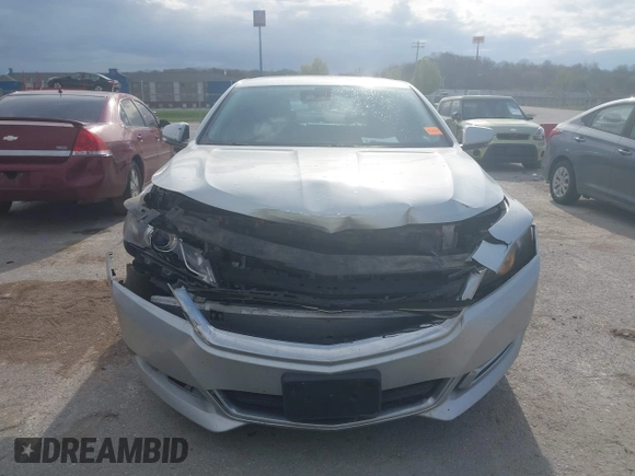 2014 Chevrolet Impala LT with VIN 2G1125S39E9313542, listed as a IAAI auction lot 41988420 with 227,093 mi miles and . Bid and sale history available at DreamBid. Image 12.