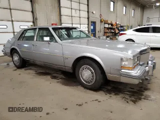 1980 Cadillac Seville z VIN 6S69NAE688845, wystawiony jako Copart lot #78749194 z przebiegiem 66 974 mil mil oraz Tytuł czysty. Historia ofert i sprzedaży dostępna na DreamBid. Obrazek 4.