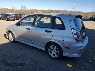 2006 Suzuki Aerio Premium z VIN JS2RC62H965350085, wystawiony jako Copart lot #80517544 z przebiegiem 32 434 mil mil oraz Szkody całkowita. Historia ofert i sprzedaży dostępna na DreamBid. Obrazek 2.