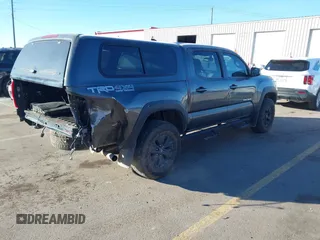 2017 Toyota Tacoma SR5 with VIN 3TMCZ5AN1HM065331, listed as a IAAI auction lot 41377968 with 93,468 mi miles and . Bid and sale history available at DreamBid. Image 4.
