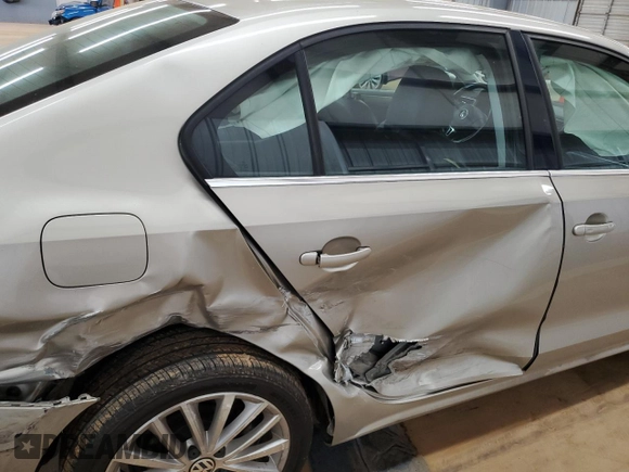 2014 Volkswagen Jetta TDI w/Premium with VIN 3VWLL7AJ9EM261908, listed as a Copart auction lot 60703205 with 128,892 mi miles and Salvage title. Bid and sale history available at DreamBid. Image 10.