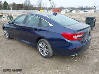 2018 Honda Accord Sedan LX 1.5T with VIN 1HGCV1F18JA042031, listed as a IAAI auction lot 41828316 with 130,864 mi miles. Bid and sale history available at carsss.com. Image 3.