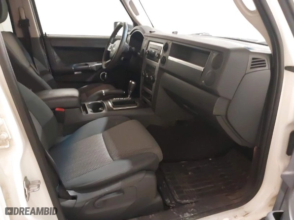 2010 Jeep Commander Sport with VIN 1J4RG4GK7AC132121, listed as a IAAI auction lot 41187854 with 155,413 mi miles. Bid and sale history available at carsss.com. Image 5.