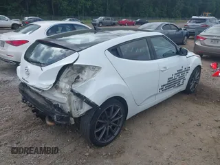 2013 Hyundai Veloster w/Gray Int z VIN KMHTC6AD3DU131703, wystawiony jako IAAI lot #42468831 z przebiegiem 188 513 mil mil oraz . Historia ofert i sprzedaży dostępna na DreamBid. Obrazek 4.