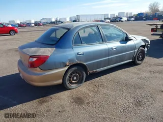 2001 Kia Rio with VIN KNADC123516046473, listed as a IAAI auction lot 41453919 with 193,582 mi miles. Bid and sale history available at carsss.com. Image 4.