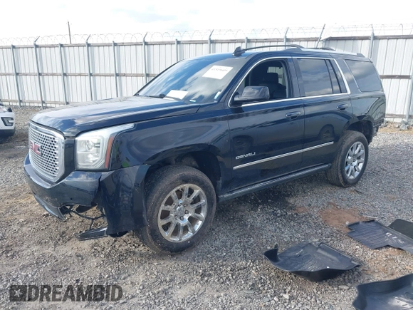 2015 GMC Yukon Denali with VIN 1GKS1CKJ8FR612971, listed as a IAAI auction lot 41519689 with 197,003 mi miles. Bid and sale history available at carsss.com. Image 2.