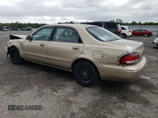 1998 Mazda 626 DX with VIN 1YVGF22CXW5733338, listed as a Copart auction lot 71796184 with 196,218 mi miles and Salvage Title. Bid and sale history available at carsss.com. Image 2.