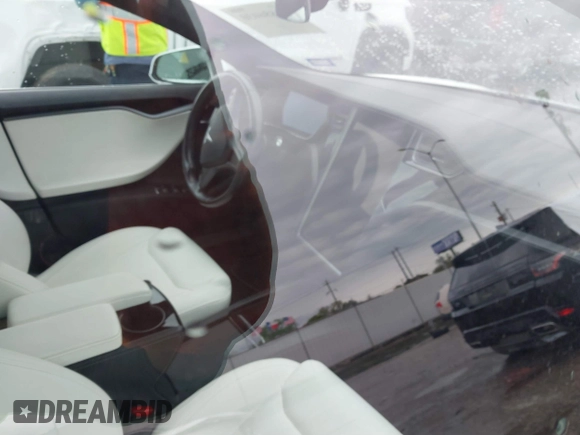 2021 Tesla Model S Long Range Plus with VIN 5YJSA1E21MF425482, listed as a IAAI auction lot 41886030 with Not provided miles and . Bid and sale history available at DreamBid. Image 16.