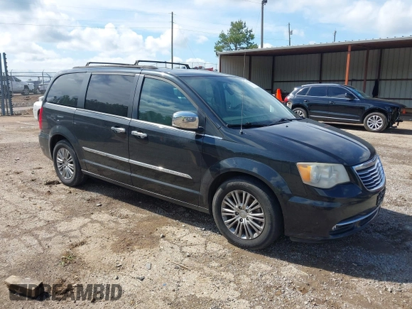 2015 Chrysler Town & Country Touring L with VIN 2C4RC1CG4FR509973, listed as a IAAI auction lot 42121743 with 199,183 mi miles and . Bid and sale history available at carsss.com. Image 1.