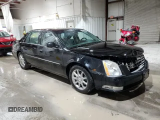 2010 Cadillac DTS 1SC z VIN 1G6KD5EY7AU128077, wystawiony jako Copart lot #58089475 z przebiegiem 203 830 mil mil oraz Szkody całkowita. Historia ofert i sprzedaży dostępna na DreamBid. Obrazek 4.