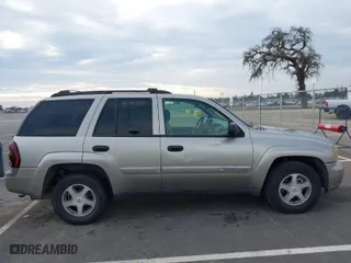 2003 Chevrolet TrailBlazer LS with VIN 1GNDT13S232204973, listed as a IAAI auction lot 41576952 with 261,709 mi miles. Bid and sale history available at carsss.com. Image 13.