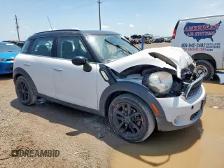 2015 MINI Countryman with VIN WMWZB3C52FWR43973, listed as a Copart auction lot 56751695 with 117,096 mi miles and Salvage title. Bid and sale history available at DreamBid. Image 4.