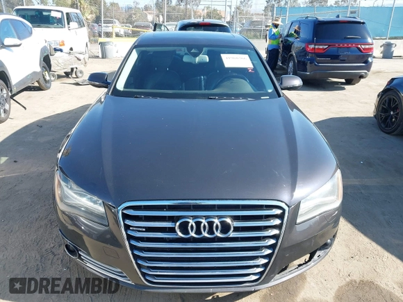 2011 Audi A8 with VIN WAURVAFD9BN014362, listed as a IAAI auction lot 41960366 with 135,244 mi miles and . Bid and sale history available at DreamBid. Image 12.