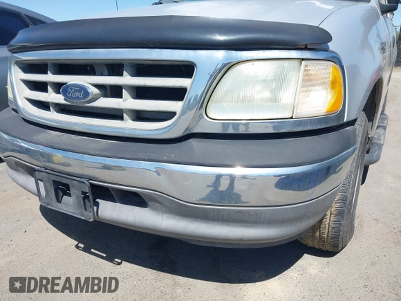 2002 Ford F-150 XL with VIN 1FTRX17252NA10531, listed as a IAAI auction lot 42686395 with 159,211 mi miles and . Bid and sale history available at DreamBid. Image 16.