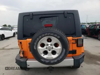 2013 Jeep Wrangler Sahara с VIN 1C4AJWBG4DL557688, выставлен на аукционе Copart как лот 57789095 с пробегом 104 461 миль миль и Списание • Salvage title. История ставок и продаж доступна на DreamBid. Изображение 6.
