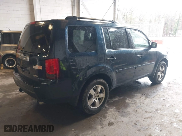 2011 Honda Pilot EX-L with VIN 5FNYF4H66BB020176, listed as a IAAI auction lot 41973659 with 238,745 mi miles and . Bid and sale history available at carsss.com. Image 4.