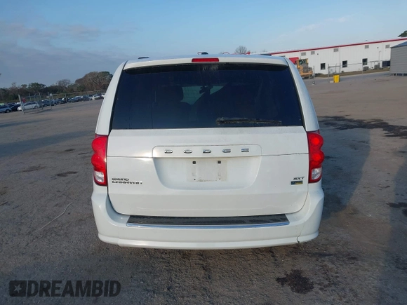 2016 Dodge Grand Caravan SXT with VIN 2C4RDGCGXGR257633, listed as a IAAI auction lot 41514684 with 108,743 mi miles and . Bid and sale history available at DreamBid. Image 16.