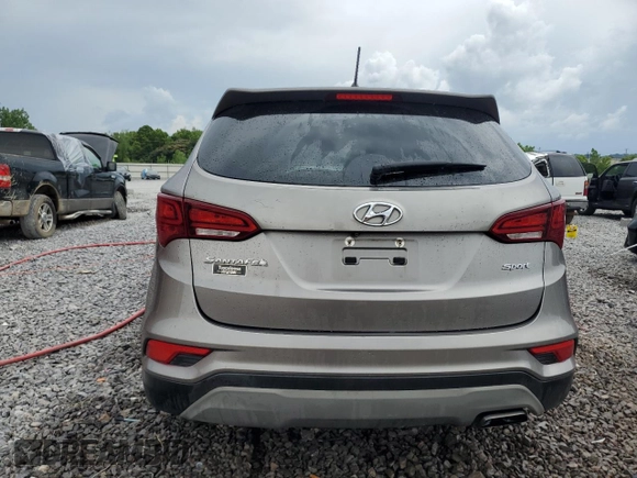2018 Hyundai Santa Fe 2.4L z VIN 5NMZT3LB2JH104519, wystawiony jako Copart lot #60915715 z przebiegiem Nie podano mil oraz Szkoda całkowita • Salvage title. Historia ofert i sprzedaży dostępna na DreamBid. Obrazek 6.