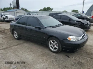 1998 Ford Contour z VIN 1FALP68GXWK137771, wystawiony jako Copart lot #55207535 z przebiegiem 41 365 mil mil oraz Szkody całkowita. Historia ofert i sprzedaży dostępna na DreamBid. Obrazek 4.