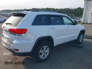 2016 Jeep Grand Cherokee Laredo with VIN 1C4RJFAG0GC324917, listed as a IAAI auction lot 42709325 with 271,953 mi miles and . Bid and sale history available at DreamBid. Image 4.