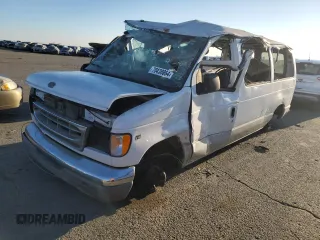 2001 Ford Econoline Passenger XL with VIN 1FMRE11LX1HA66495, listed as a Copart auction lot 70438864 with 306,671 mi miles and Salvage Title. Bid and sale history available at carsss.com. Image 1.